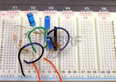 238576-closeup-of-an-electronic-breadboard--wires-and-components-in-place.jpg