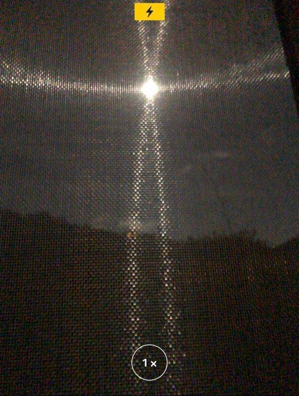 A strange phenomenon occuring when viewing the moon through window screens