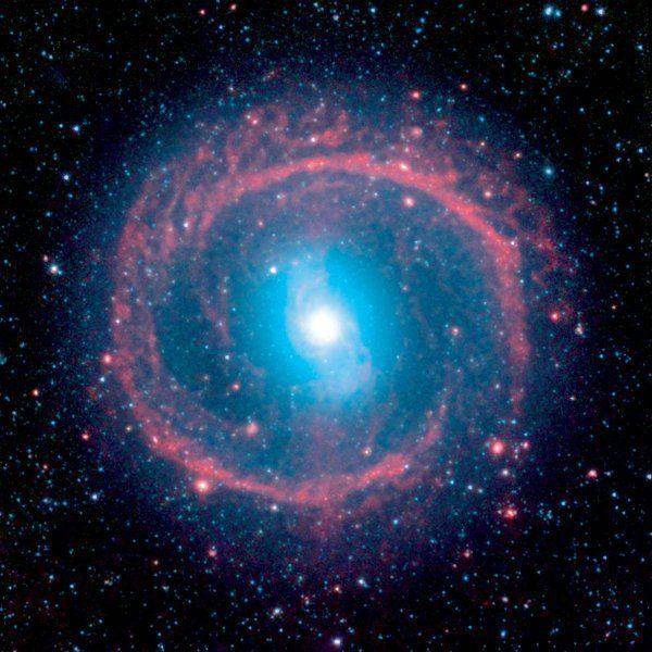 churning-galaxy-boasts-a-fiery-halo-of-baby-stars.jpg
