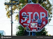 depositphotos_135008802-stock-photo-stop-sign-with-stickers-in.jpg