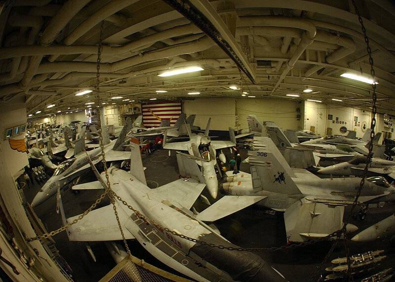 F-A18 Hornets pack the hangar deck the Nimitz class carrier USS Harry S. Truman (CVN_75).jpg