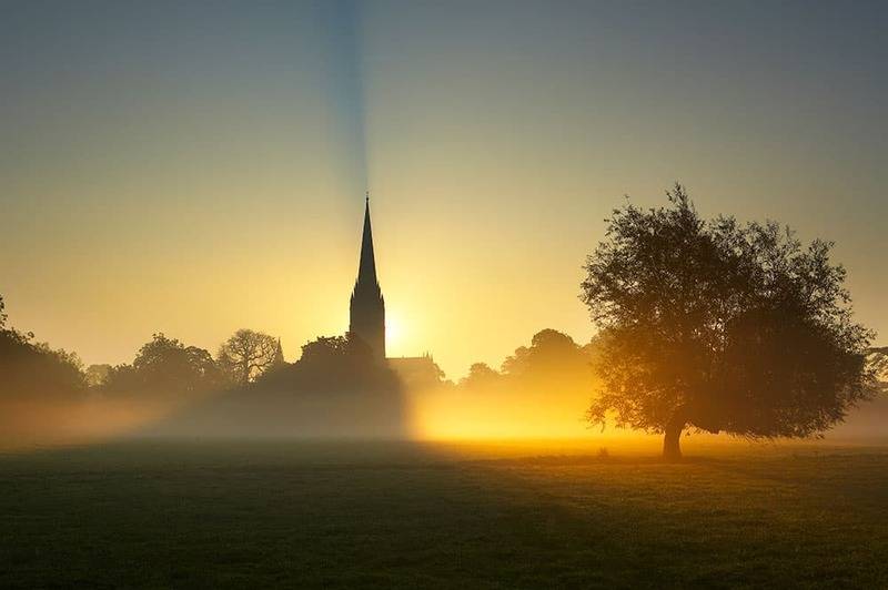 utdoor-light-sun-rising-behind-Salisbury-Cathedral.jpg